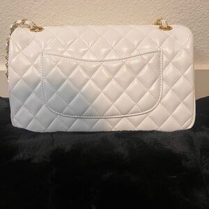 Elegant White Quilted Shoulder Bag with gold tone accents. Used twice.